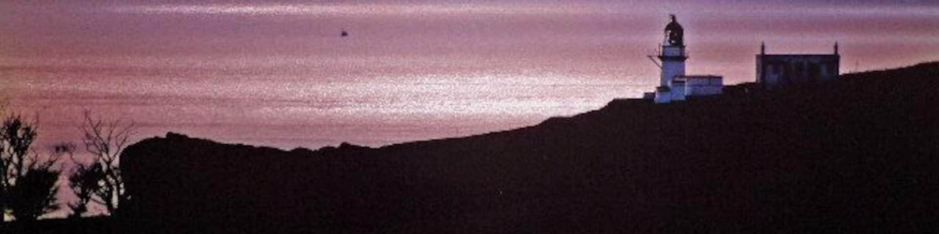 Sunset at Todhead Lighthouse. When the sun sets, the fishermen come home.