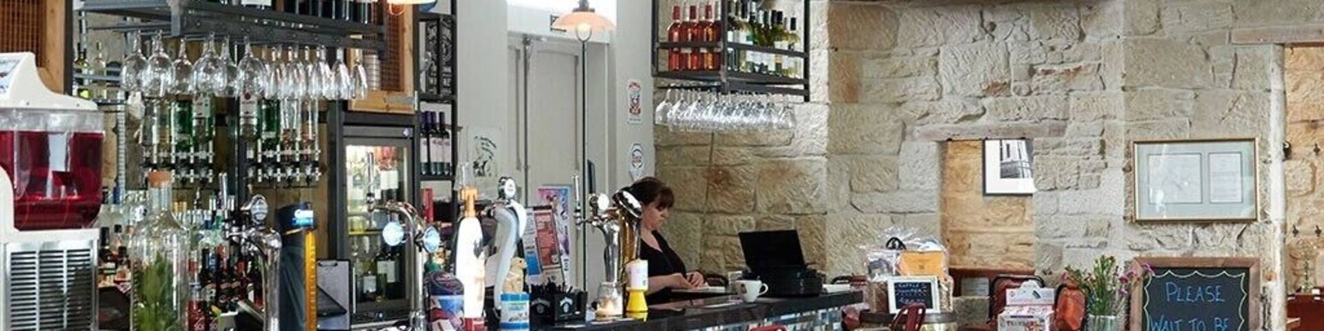 Platform 1864, Tain in Scotland.
A typical town in the Highlands, Tain is a great place to wander around taking in the atmosphere.
We visited the museum which has many examples of Tain silverware and a great insight into local history.
Here's a shot of Platform 1864, a cafe at the railway station. We spent time here relaxing over lunch. There's a very good menu and the owner has made a great job in the styling of the interior.