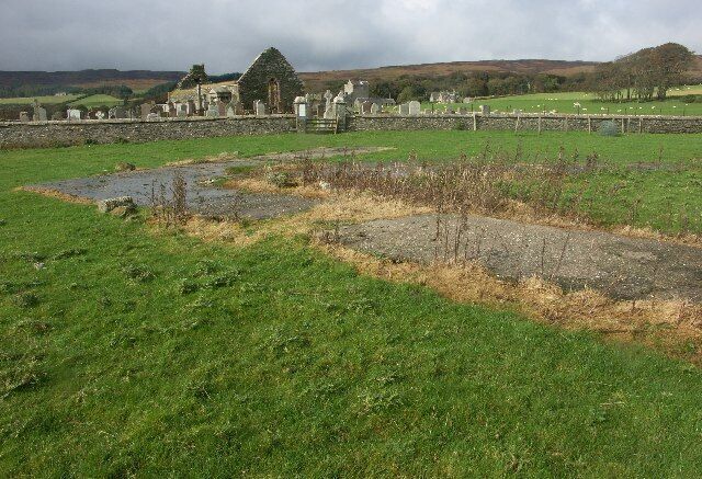 WWII large concrete arrow. This was part of nearby bombing range. Skipness Chapel and Castle behind.