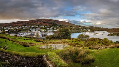 Sweeping panorama from the top of the hill next to Royal Castle Tarbert looking down at the bay and small city of Tarbert in Argyll and Bute Scotland United Kingdom