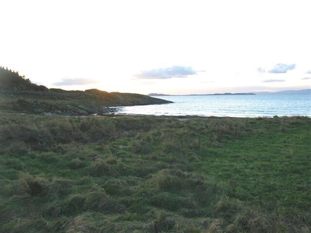 Shoreline from The Battery The Island of Gigha showing in the distance.