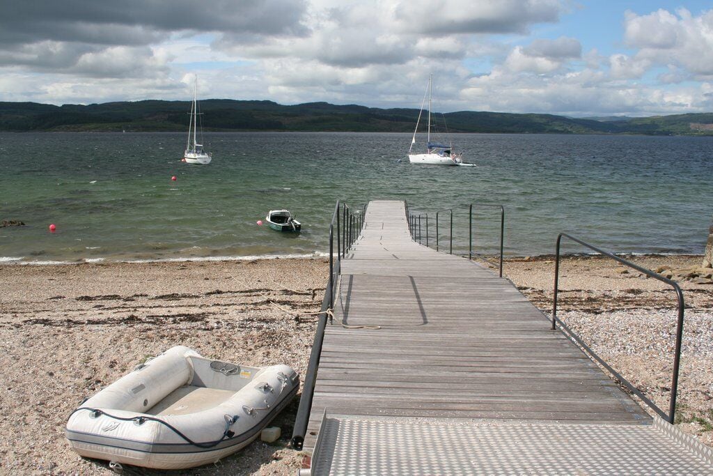 Jetty and boats, Otter Ferry This jetty is west of the quay.