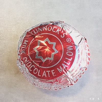 The Tunnocks Tea Cake, a Scottish institution to have with your cup of tea.
Inside the wrapper is a mallow topped biscuit covered in chocolate.