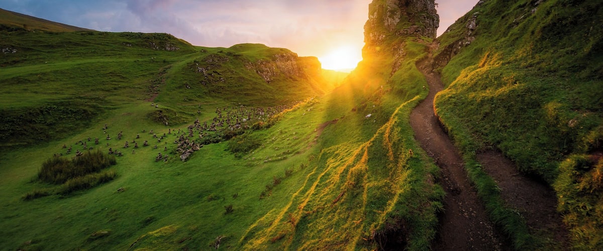 On the West side of Trotternish at Balnacnoc - above Uig, is the Fairy Glen â a Quirang-like landslip in miniature. The road winds around small round-topped grassy hills with lochans (ponds) in between which gives the glen an otherworldly feel.