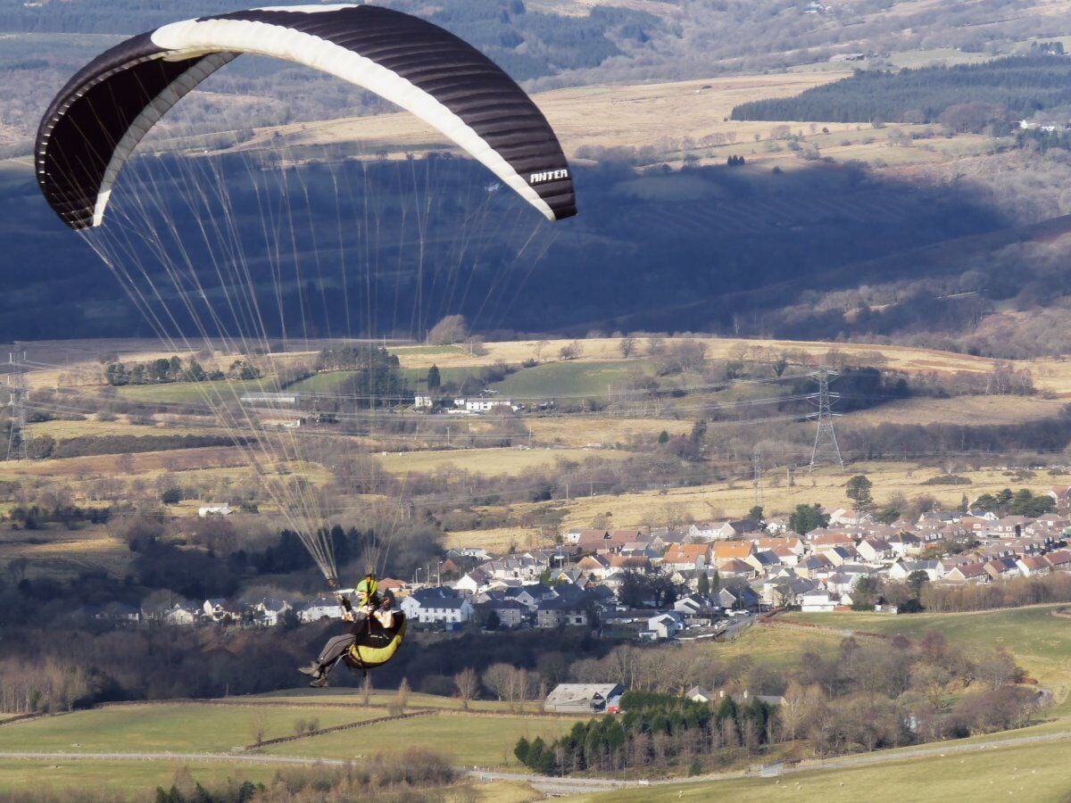 Paraglide off the mountain Paraglider is a very active sport in the hills and mountains of this part of Wales. Providing a great spectator sport for many at the wonderful viewpoints in the area. This was taken from the Rhigos viewing point near to Hirwaun.