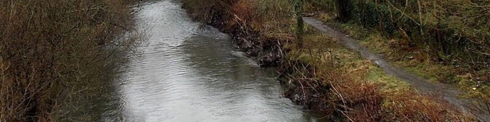 River and track, Cwmbach. The Afon Cynon flows away from the A4059 bridge near Cwmbach railway station.