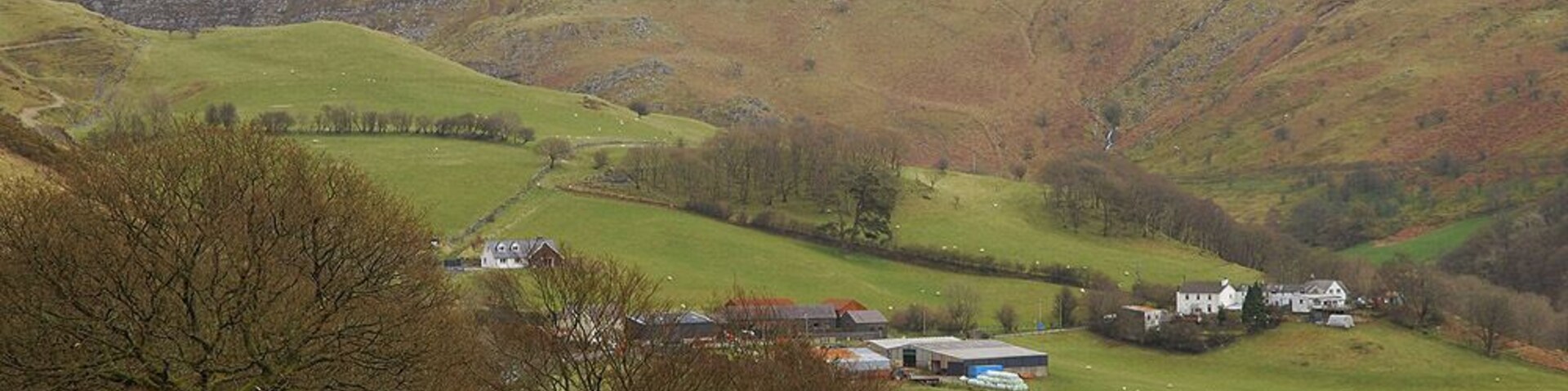 Cwmystwyth seen from the west Cwmystwyth is a fairly scattered community, the farm and nearby houses are about as dense as it gets, although there is another small group of houses just down the road from where the photograph was taken.
