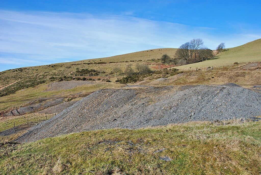 Waste tips on the side of Cwm Newydion Some of the smaller tips from the extensive lead and copper mines which exist in this and adjacent squares.