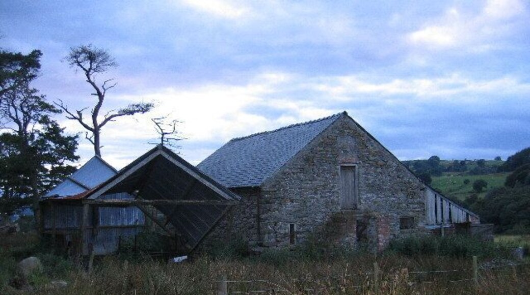 Ysgubor-y-waen. Derelict farm buildings. We surprised some sheep that were inside. The guttering was broken and the water is causing serious damage to the wall. It probably won't be standing much longer.