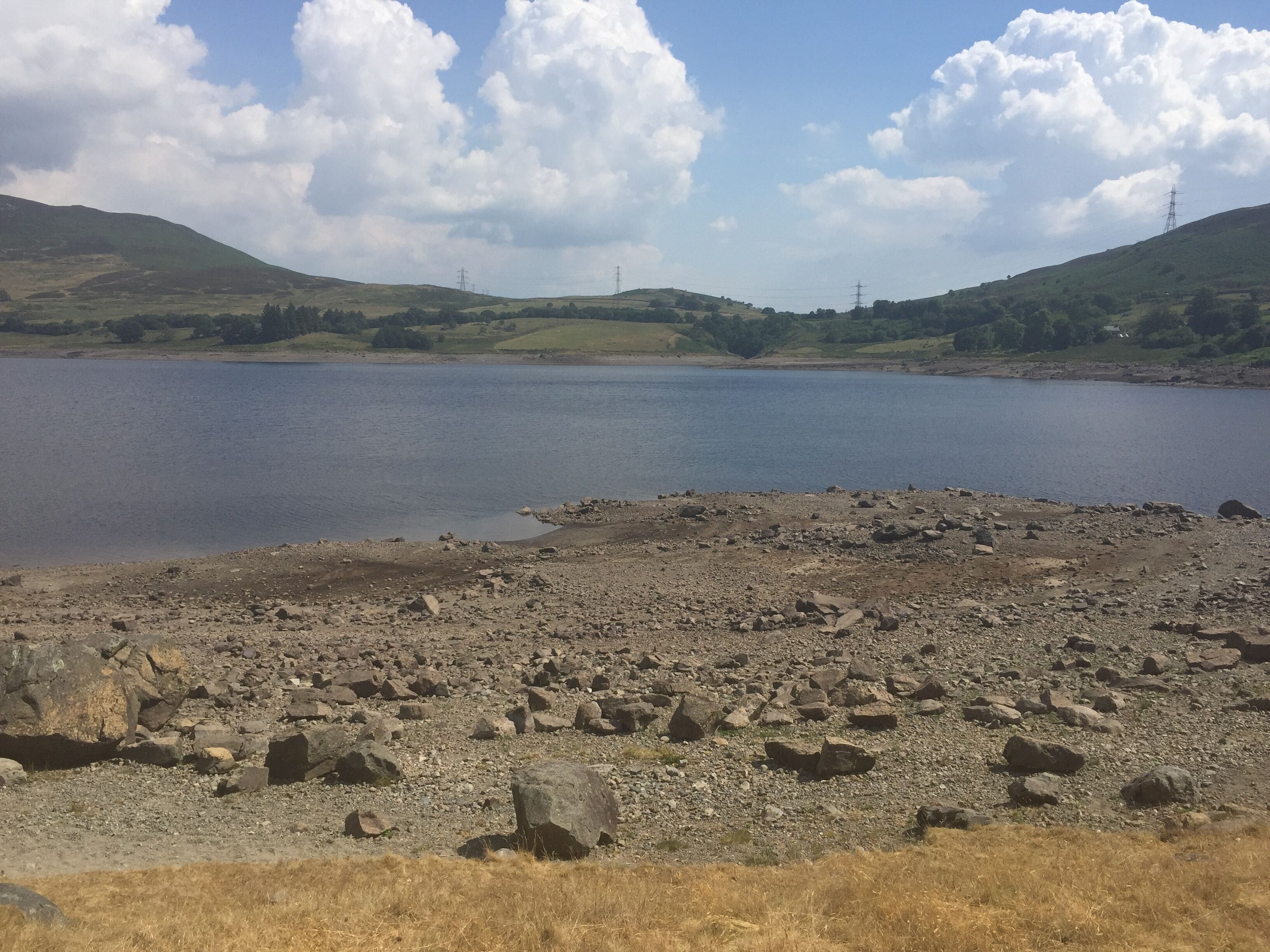 Llyn Celyn during the extended hot spell of summer 2018, showing low water levels.