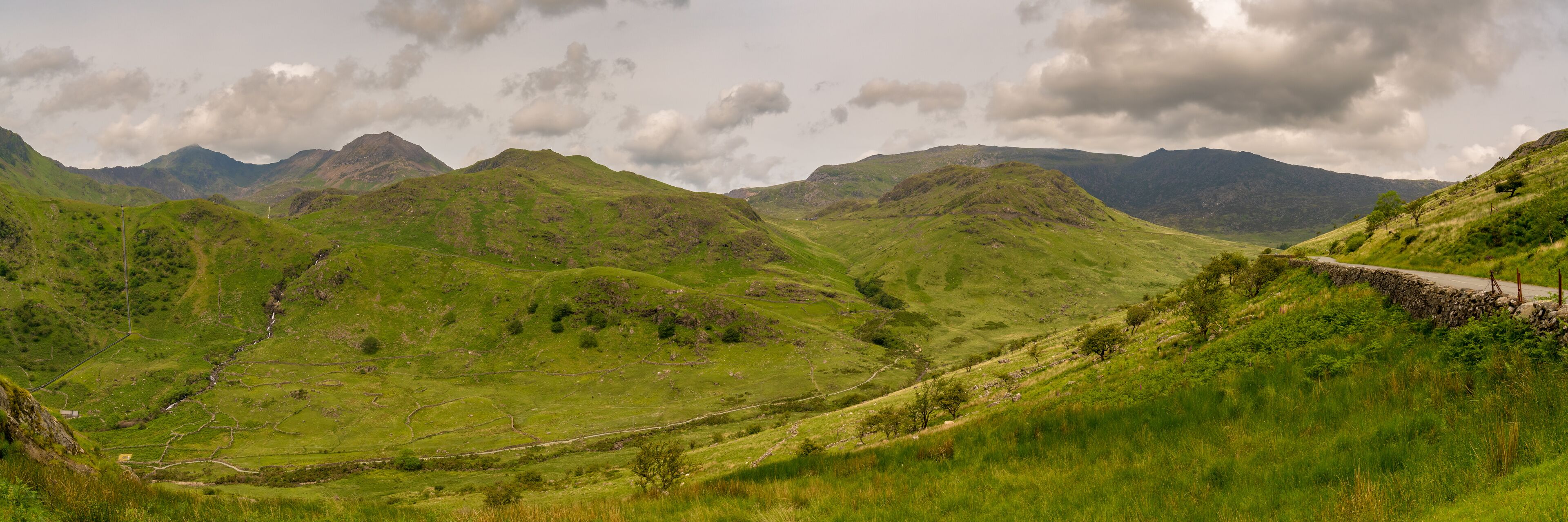 Snowdonia Landscape on the road between Capel Curig and Beddgelert, with the valley of the River Glaslyn and Mount Snowdon in the background, Gwynedd, Wales, UK