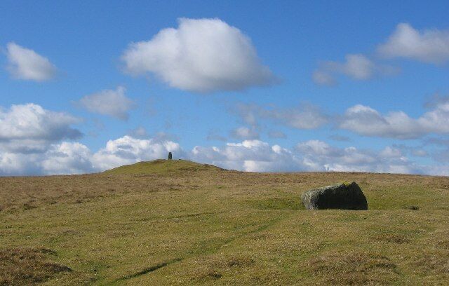 Tumulus, Aberedw Hill. The hills of Wales are home to many bronze age relics and burial mounds. On rocky hills they take the form of cairns, but on the soft rocked Radnorshire hills they are grassed over mounds. The Ordnance Survey often used that little extra elevation for their trig pillars.
 Note the erratic boulder in the foreground.