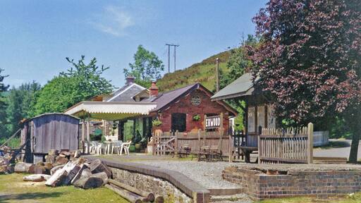 Former station at Erwood, 1994. View NW, towards Builth Wells and Moat Lane: ex-Cambrian Railway Moat Lane - Brecon (Mid-Wales) line, closed completely 31/12/62. This is an unusual transformation of a former station into a café, on the main road down the Wye Valley.
