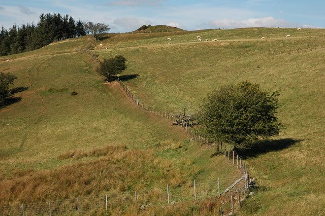 Earthworks at Waun Gynllwch The remains of an early motte at Waun Gynllwch, here viewed from the south.