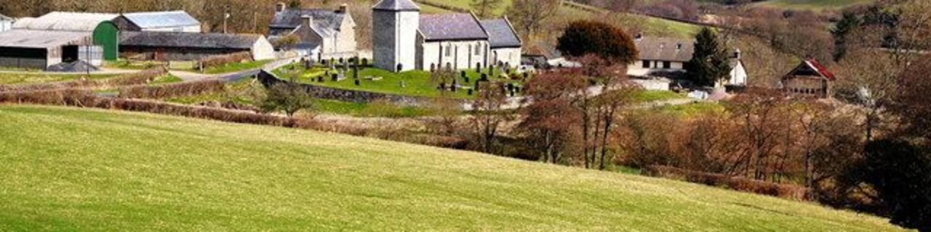 Llanddewi'r Cwm, Powys (formerly Breknockshire), showing St David's parish church in its ancient circular churchyard