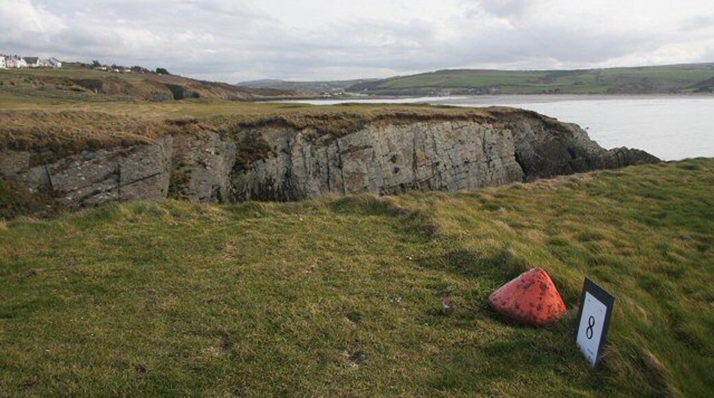 Cardigan Golf Club 8th hole One of the more testing shots in golf - the par three 8th hole at Cardigan Golf Club, where a deep and wide chasm must be crossed with the tee shot.