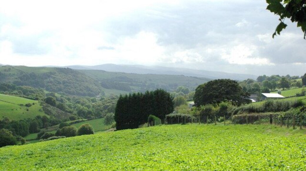 Valley of the upper Afon Clwyd View towards the Berwyn Mountains. The farm to the left is Pendre-bach. It is not named on the inset map, although Pendre-fawr lower down the road is named.