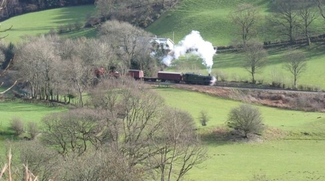 A Llangollen Railway Steam Locomotive in the River Dee Valley The locomotive from The Llangollen Railway kindly steamed into the square just in time for me take this photo. It stopped just past the house Garthydwr and is pictured reversing back down the line towards Llangollen. Although the house is in the next square, the locomotive and at least the first two wagons are past the hedge line west of the house, and therefore in this square. The River Dee is out of sight in the bottom of the valley below the camera. If anyone can identify the loco I will add the details to the photo.