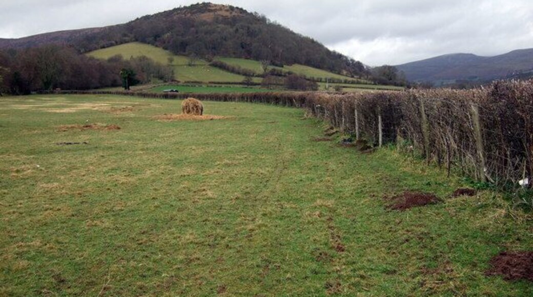 Pen-tir, Cwmdu The prominence of Pen-tir Hill overlooks the village to the east and was a fortified encampment close to, and probably associated with, traces of Roman occupation here. The woodland covering its slopes is called Coed y Gaer/wood by the camp. The mountain extends northeast towards Mynydd Llangorse.