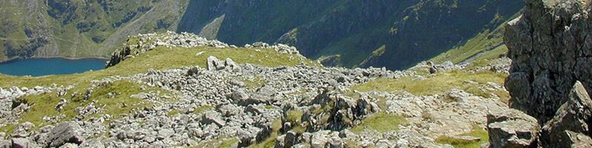 Craig Cau from Pen y Gadair Taken from a bit to the south of the summit, looking towards the great cliff of Craig Cau, the shorn off end of Mynydd Pencoed. Llyn Cau is just visible on the left.