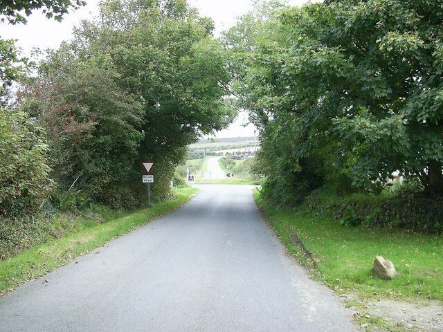 Approach to the A4219 This is a three road junction.Two minor roads form a junction by Rhosfelen, the location of the smithy many years ago, before the minor road from the Jordanston area joins the A4219.The A4219/A40 road junction came be seen in the distance.