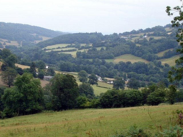 Llwybr Ceiriog Trail above Pentre Farm. Llwybr Ceiriog Trail in the Ceiriog Valley from above Pentre Farm. The Pontfadog loop of the trail descends a side valley towards the Afon Ceiriog. The bridleway makes an attractive descent from the ridge, through hill pasture and woodland. The view shows the lower Ceiriog valley.