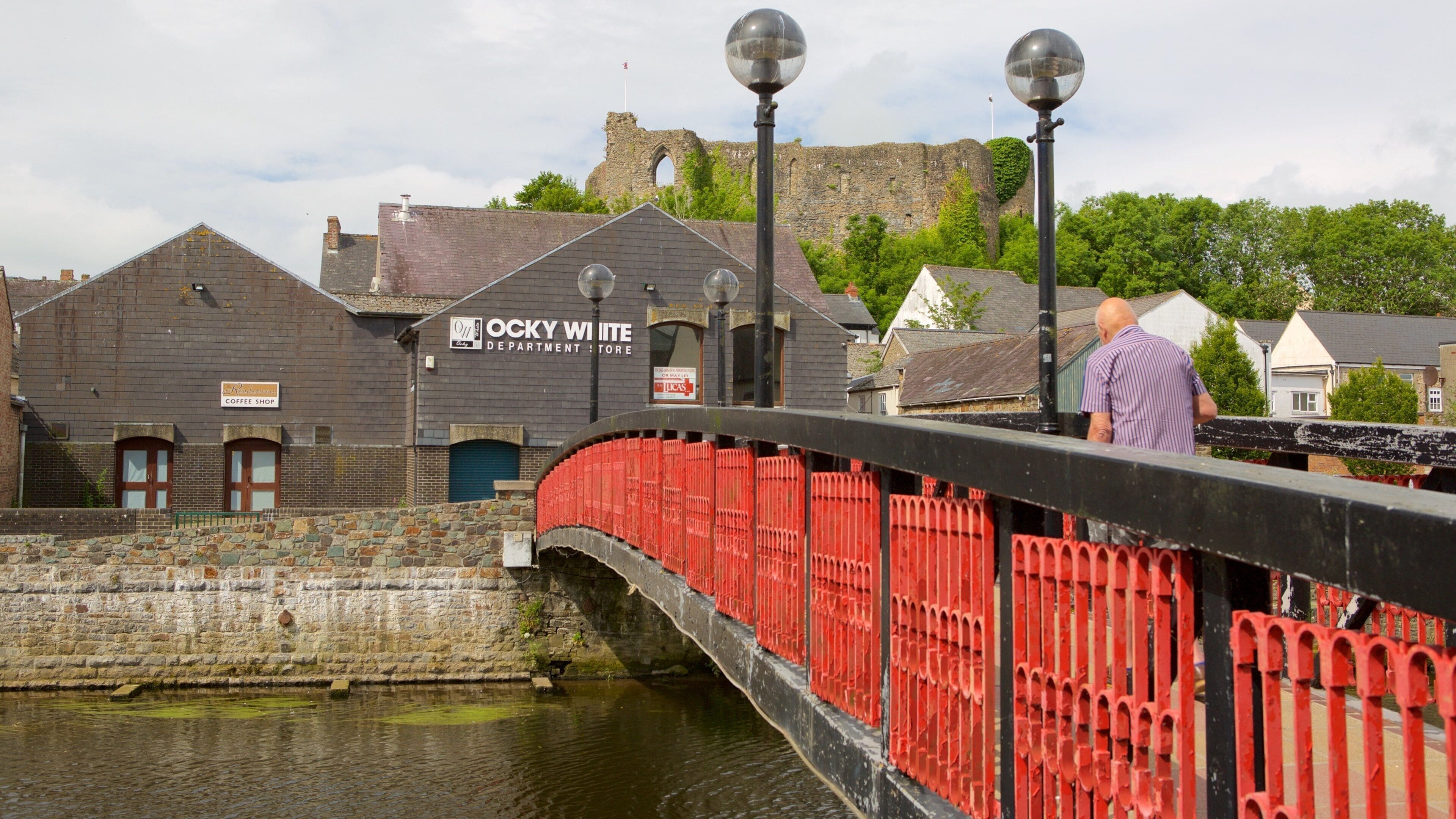 Haverfordwest featuring a small town or village, a bridge and a river or creek
