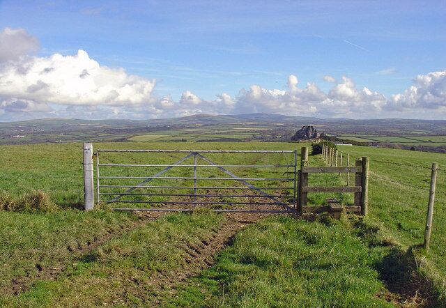 Stile on footpath over Treffgarne Mountain On the horizon is the Preseli ridge. In the middle distance is the top of Poll Carn.