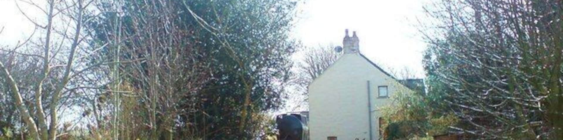 Hayscastle Tump - a Bronze Age Round Barrow Hidden in the trees behind the house, Brynamlwg (which translates as 'Prominent Hill') the Bronze Age barrow is 32 metres diameter by 2 metres high. There was once evidence of funerary ware such as cremation urns and an upright stone was thought to act as a prop. Link www.historicwales.gov.uk