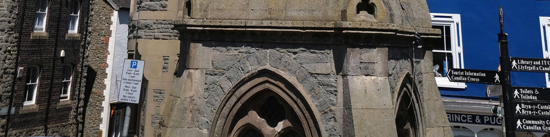 Knighton is a market town and community on the River Teme, straddling the border between Powys, Wales and Shropshire, England