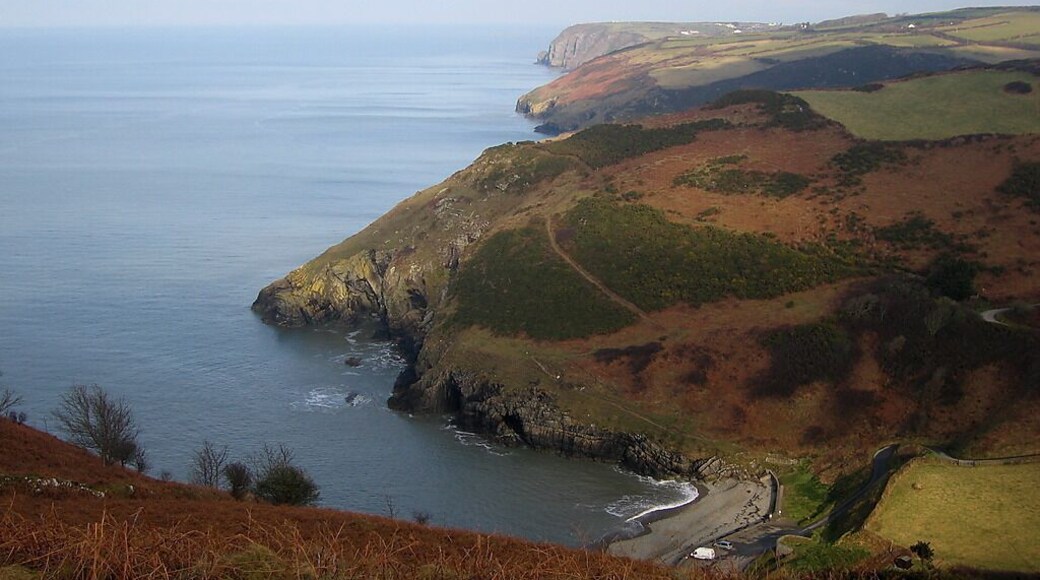 Cwmtydu Located at the mouth of the Afon Tydu, Cwmtydu is a small village with a tiny beach in a deep breach in the coastal cliffs. The Cerdigion Coast Path, from which this was taken, can be seen snaking back up the cliffside opposite. On this (south) side of Cwmtydu, the gradient would be too steep, and the long-distance path has been routed inland to reach the valley ground.