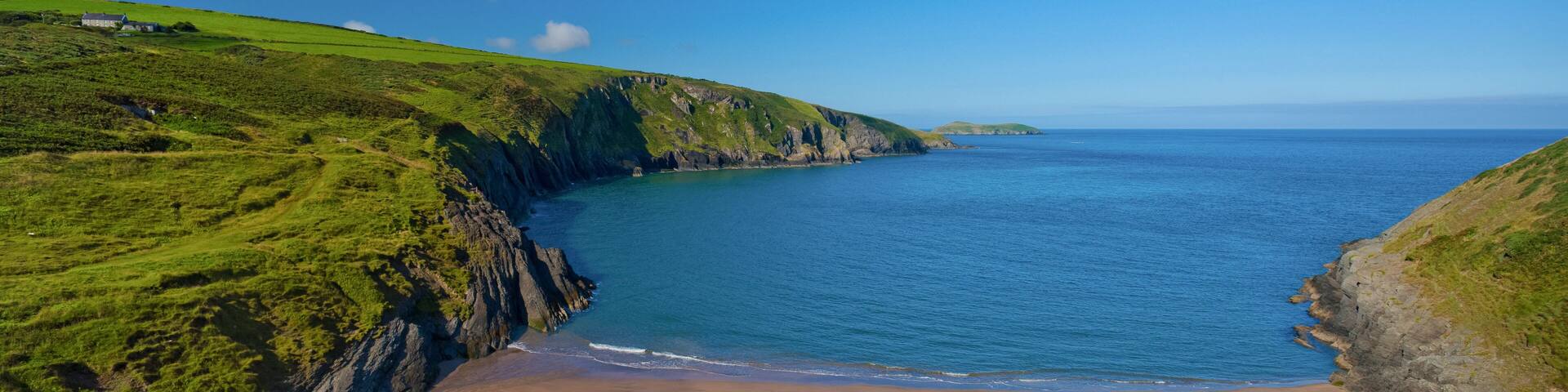 Secluded sandy beach at Mwnt Cove near Cardigan, Wales, UK