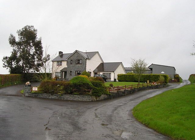 Cwmnanteinon Imposing house with block of stables beyond.