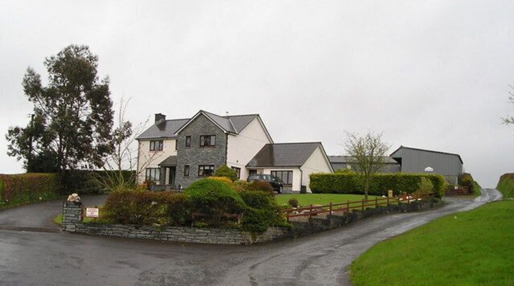 Cwmnanteinon Imposing house with block of stables beyond.