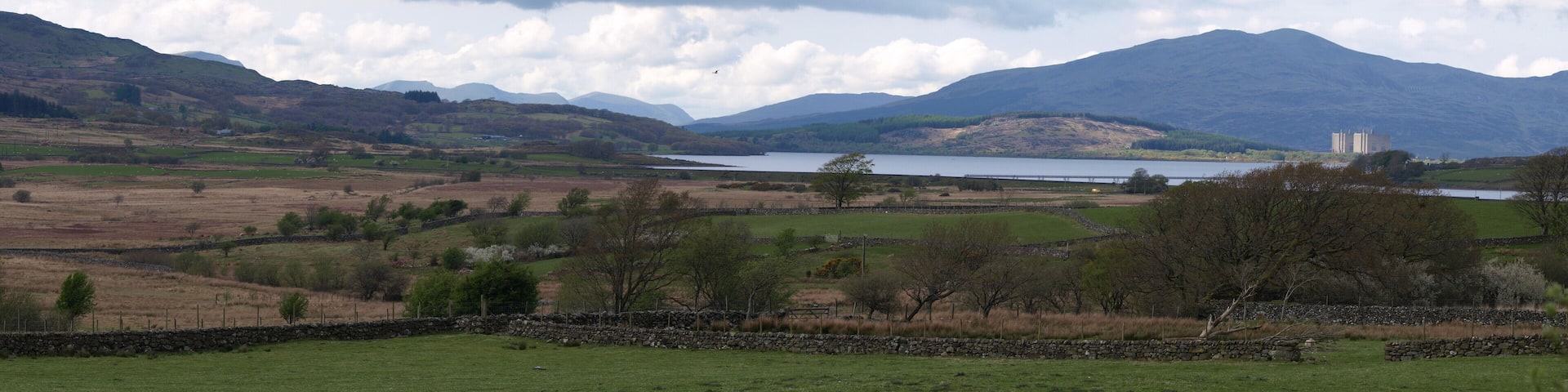 A panoramic view of Trasfynydd nuclear power station and adjacent lake