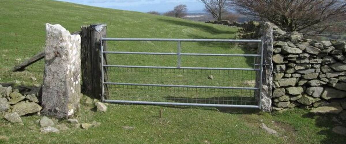 Gateway on the track below Fron Hen. With three gateposts on the left and one on the right there have obviously been a number of a changes to the gateway on this old track below Fron Hen. See also 1244409