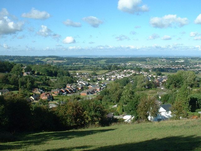 Looking down on Gwernymynydd. Looking north east, from the minor road running south from the A494, which gives splendid views of the area.