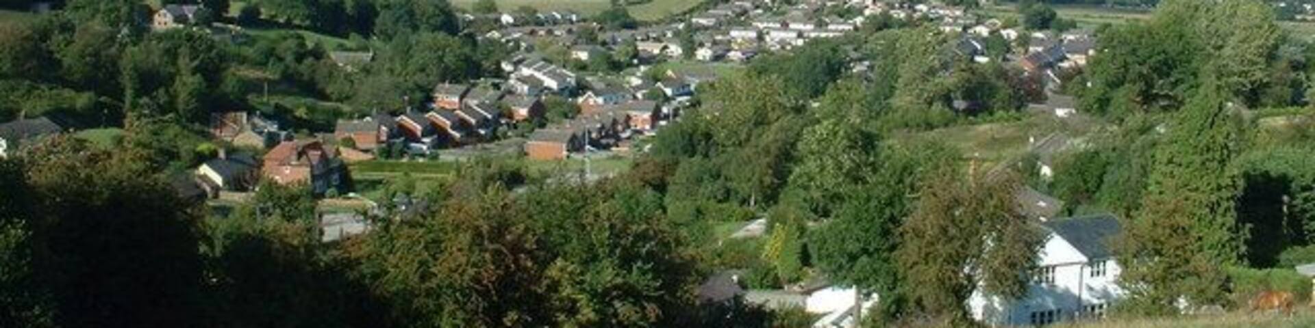 Looking down on Gwernymynydd. Looking north east, from the minor road running south from the A494, which gives splendid views of the area.
