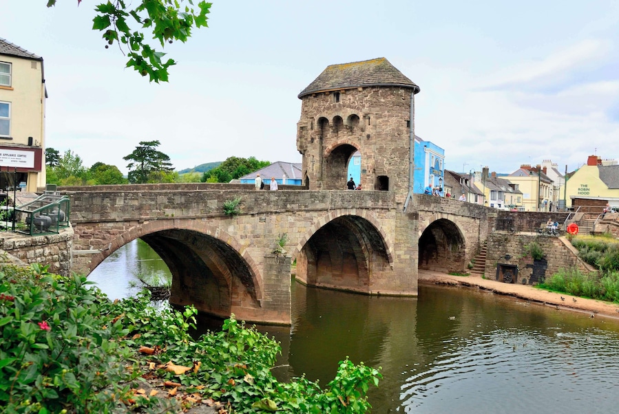 Monnow Bridge is a medieval bridge over the namesake river Monnow in the town of Monmouth, Wales. The existing bridge was completed in the late 13th century. It is the only remaining medieval fortified bridge in Britain.