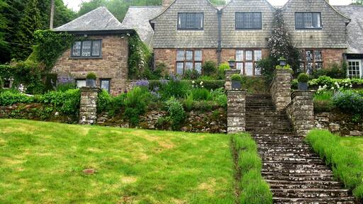 Looking up at High Glanau Manor from the pond. High Glanau (also known as High Glanau Manor) is a country house and Grade II* listed building within the community of Cwmcarvan, Monmouthshire, Wales.