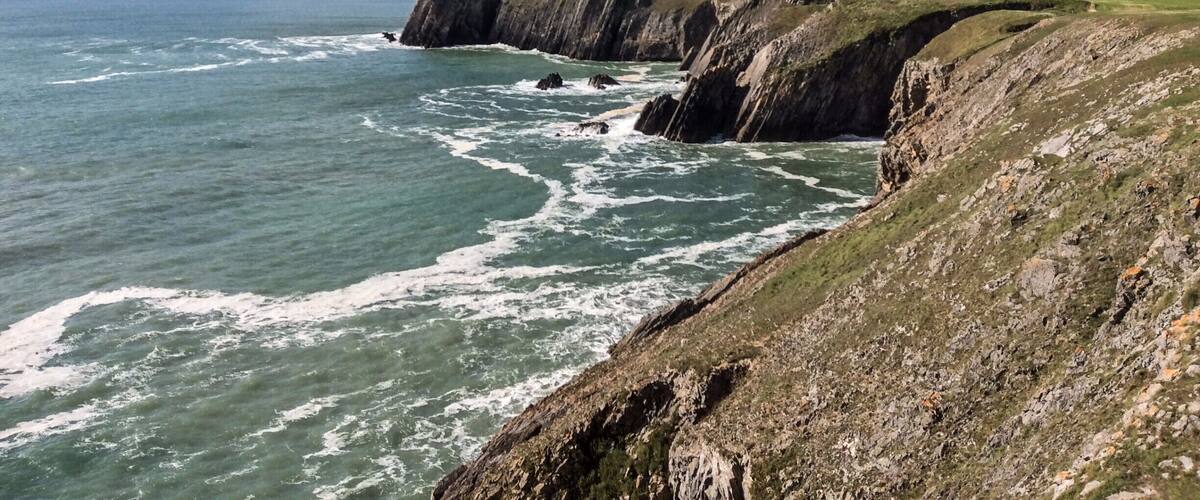 The world dies over and over again, but the skeleton always gets up and walks.
Henry Miller
Along this particular coast line, the proud rocky boned giants with strong chins march tirelessly into the cold gnashing teeth of the timeless ocean. Everyday, the pounding surf gives their eroding faces a shave, but if you listen carefully, you can hear reassuring whispers speaking kindly of the mass behind ready to come forth and serve.
#hiking