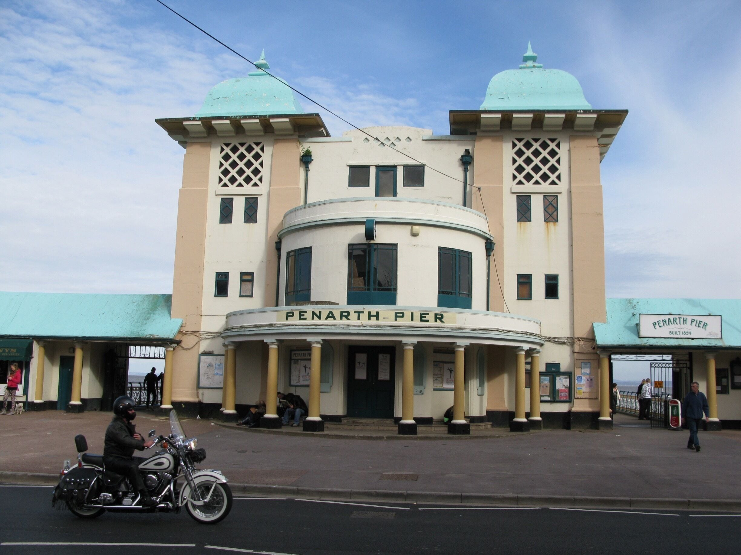 A historic Penarth Pier building with a distinctive dome and columns.