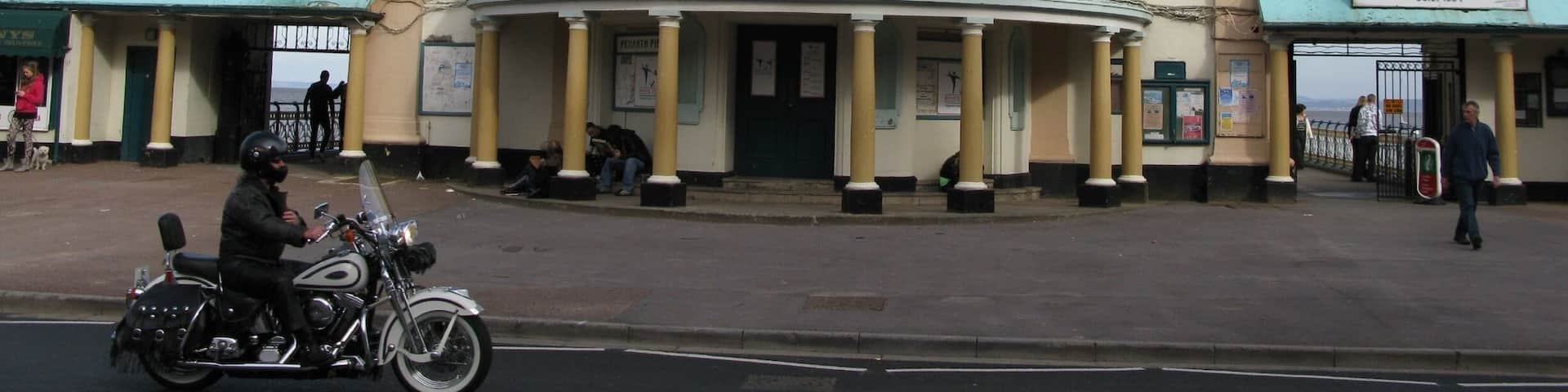 A historic Penarth Pier building with a distinctive dome and columns.