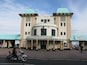 A historic Penarth Pier building with a distinctive dome and columns.