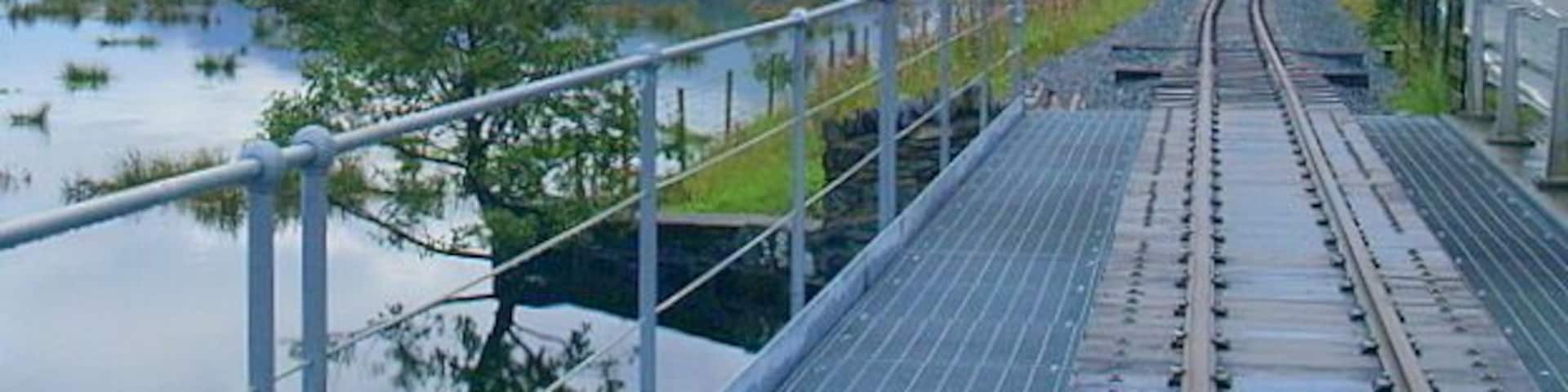 Cnicht in cloud, from Pont Croesor Looking along the new Welsh Highland Railway bridge over Afon Glaslyn, at Pont Croesor, during construction in August 2008.