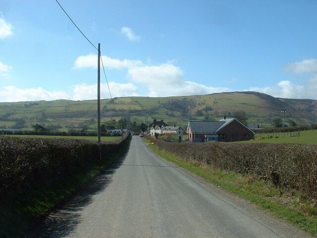 Pant-y-dwr Looking along the unclassified road to its junction with the B4518.