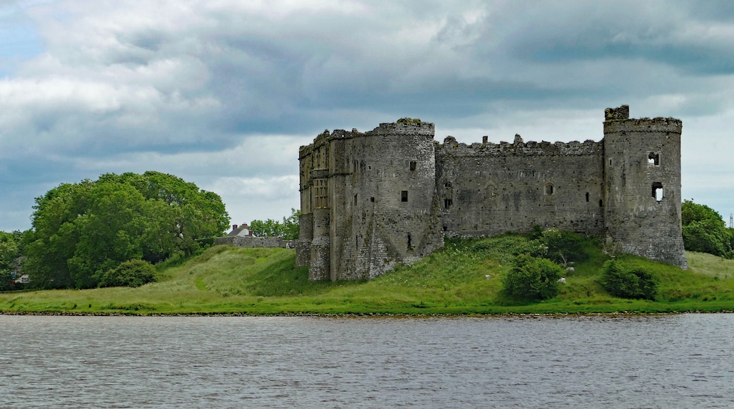 Looking magnificent across the flooded mill pond of Carew Mill. Fortification here dates from the Norman incursions into Wales in about 1100 but the structure seen today dates from the late thirteenth century and the third generation of "Carews".
