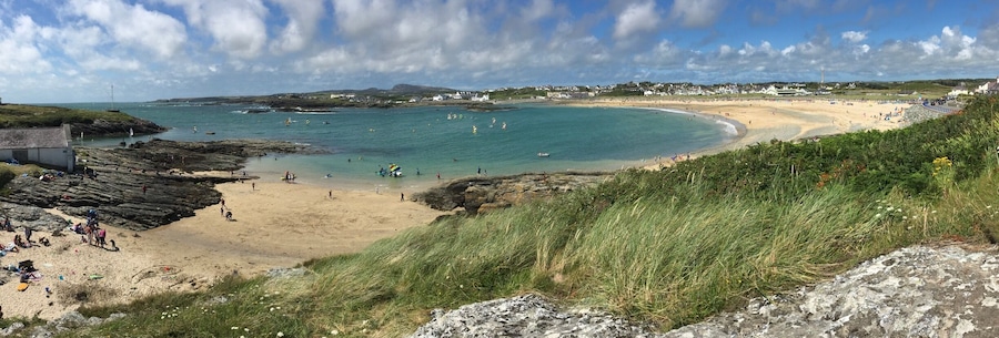 Trearddur or Trearddur Bay is a community, village and seaside resort south of Holyhead on the west coast of Holy Island off the north-west coast of Anglesey in Wales.