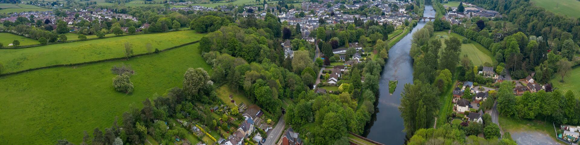 Dawn aerial panoramic view of the picturesque village of Usk in Gwent, South Wales, UK