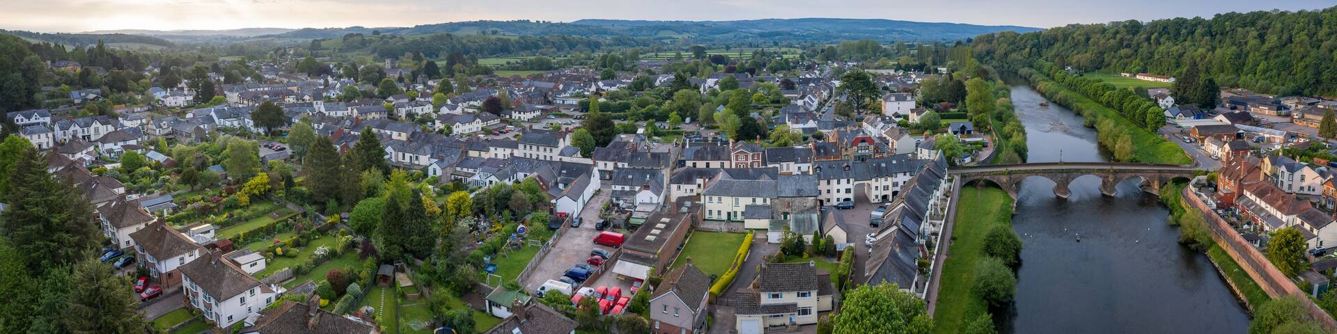 Dawn aerial panoramic view of the picturesque village of Usk in Gwent, South Wales, UK
